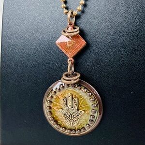 Gorgeous, bohemian chic, hand, zen pendant necklace